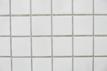 White ceramic wall and floor tile abstract background.