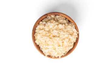 Rice flakes isolated on white background.