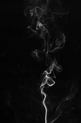 abstract swirl fragment shape movement motion effect of white smoke on black background. burn of incense trail flowing in dark. smell environment air pollution.