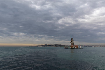 Maiden Tower (Tower of Leandros, Turkish: Kiz Kulesi) tranquil scenery at the entrance to Bosporus Strait in Istanbul, Turkey (KIZ KULESI – SALACAK-USKUDAR)