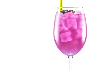 A close up of an alcohol cocktail with a straw on white background