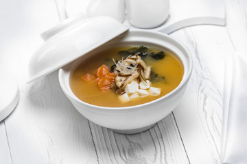 Tasty fish soup with onion in a bowl