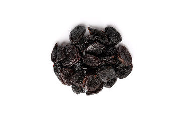 Dried prunes isolated on white background.