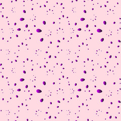 A lot of blueberry drops and petals on a pink background in mother of pearl.