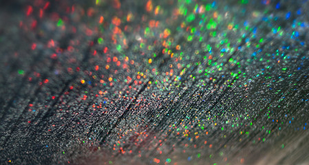 Glitter of water droplets on black background