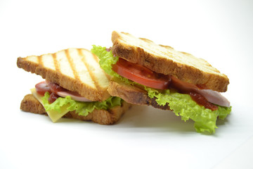 Ham and salad sandwich on white background