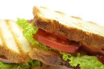 Ham and salad sandwich on white background