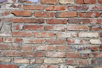 Red brick. Old brick wall, old texture of red stone blocks closeup. Wall texture. Copy space.