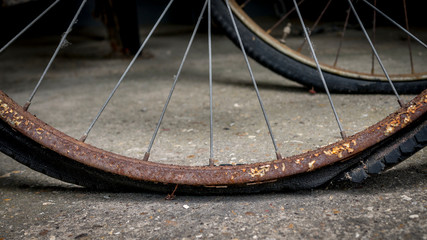 Old Bicycle with Flat Tyre