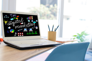 desktop with laptop and digital marketing web