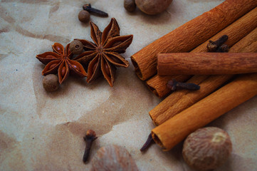 Spice on the table. Aromatic brown cinnamon stick
