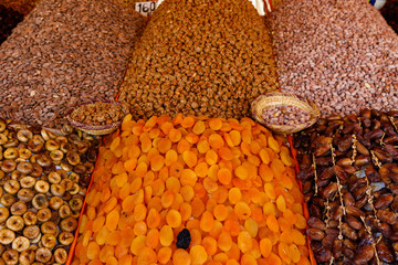 Dried fruit and nuts on market stall at the bazaar in Marrakesh, Morocco
