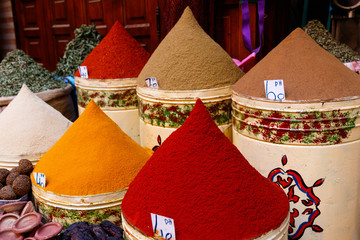Diversity of colorful spices on a bazaar market in Marrakesh Morocco