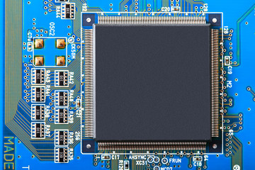 Electronic circuit board close up.