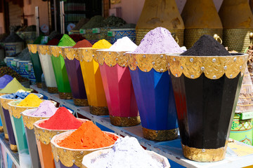 Diversity of colorful spices on a bazaar market in Marrakesh Morocco