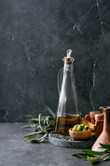Green olives in wooden bowl