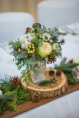 wedding table with floral arrangement prepared for reception, wedding, birthday or event...