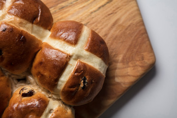 Traditional hot cross buns with raisins. Easter springtime treat