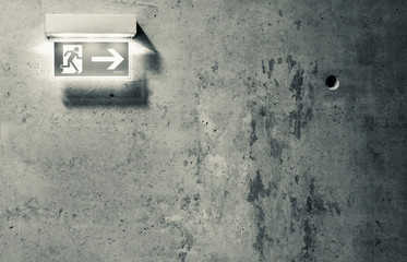 black and white emergency exit pointer