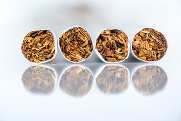 Fototapeta na wymiar Cigarettes close up on a white background.