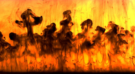 The smoke on the background of fire