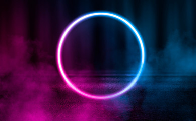 Background of empty stage, room. Reflection on wet pavement, concrete. Neon blurry lights. Neon circle figure in the center, smoke