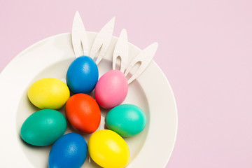 easter eggs on pink background