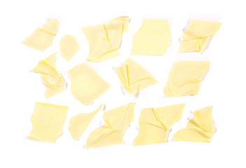 Set of yellow tapes on white background.