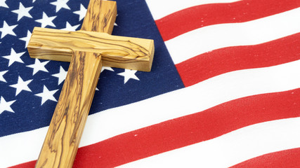 Wooden Cross on American Flag