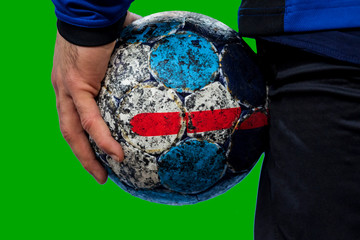 Player holding the ball for handball on green screen