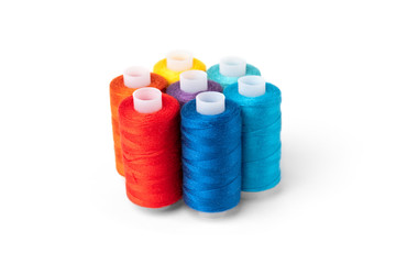 Coloured threads isolated on white background.