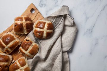 Traditional hot cross buns with raisins. Easter springtime treat