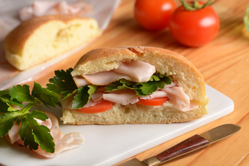 stuffed sandwich with turkey and tomato breast