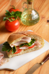 stuffed sandwich with turkey and tomato breast