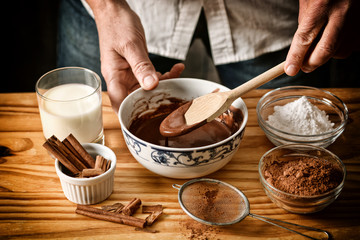 preparation of chocolate desserts with ingredients around - desaturated effect - selective focus