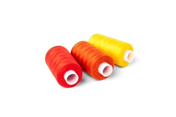 Coloured threads isolated on white background.