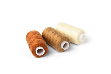 Coloured threads isolated on white background.