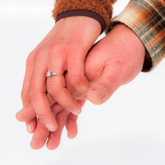 Newly Engaged Couple Holding Hands