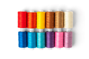 Coloured threads isolated on white background.