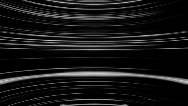 Black and white parallel round lines moving endlessly,seamless loop. Beautiful glowing arcuate rays of shining light, monochrome.