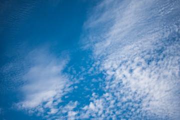 Creative layout made of blue sky with white clouds, copy space