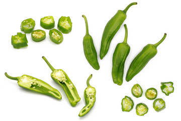 chilli pod - set of fresh whole and chopped fresh green chili peppers - isolated on white