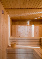 Fototapeta na wymiar Wooden sauna room, vertical
