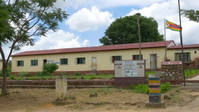 Wide Shot of the Main Building at a Primary School in Rural Zimbabwe, Africa on a Beautiful Sunny Day