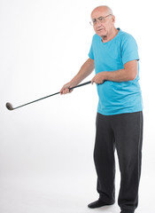 senior man plays golf