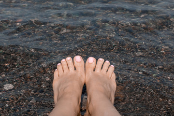 feet on the beach