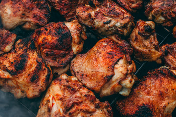 Chicken meat is grilled.