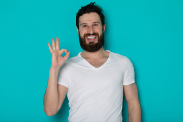 Portrait of cheerful smiling bearded man