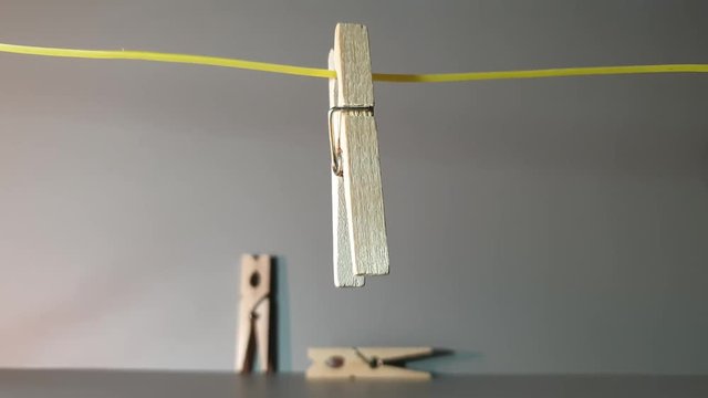 The Clothes pegs made of wood. Wooden clothes pegs
