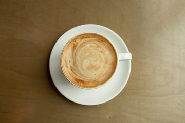 Close-up of coffee latte and cappuccino as flat lay from above